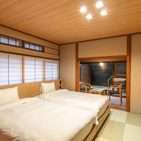 源泉掛け流しの宿albergo湯楽 Yugawara Eksteriør bilde